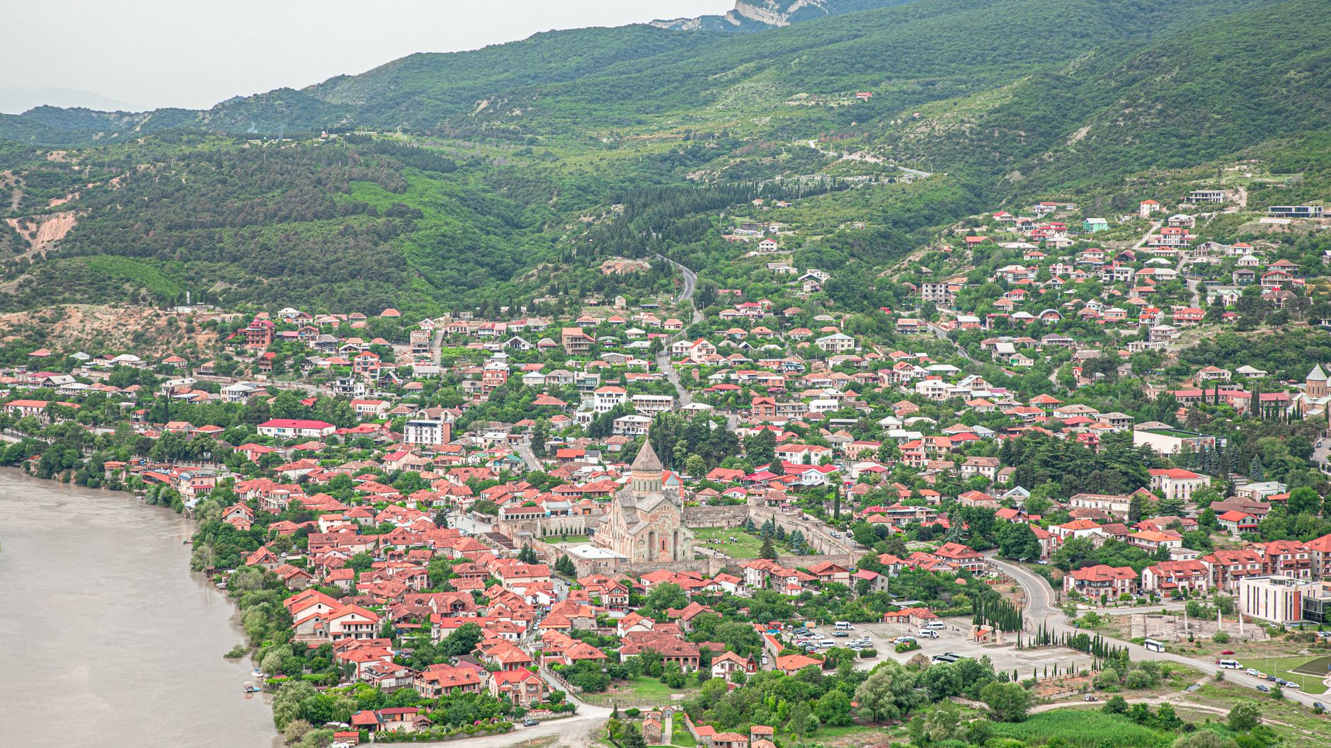 Scenic aerial view of Mtskheta, featuring the historic Svetitskhoveli Cathedral.
