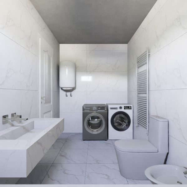 Wall-mounted water heater in a bathroom laundry room