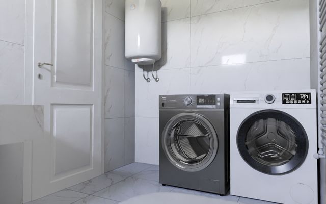 Water heater installed in a home laundry room