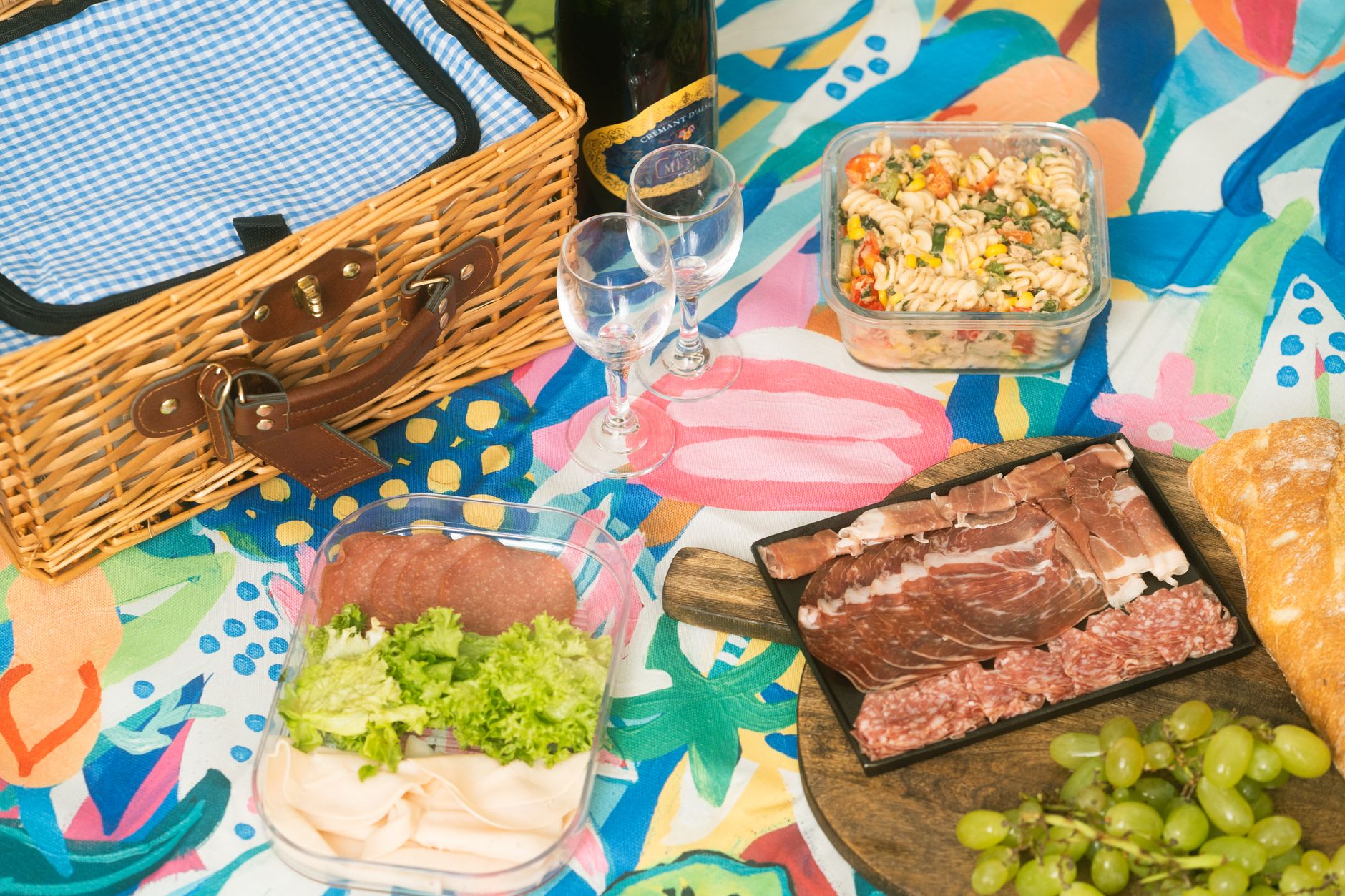 Colorful Italian deli salad with sliced meats, provolone cheese, and fresh greens