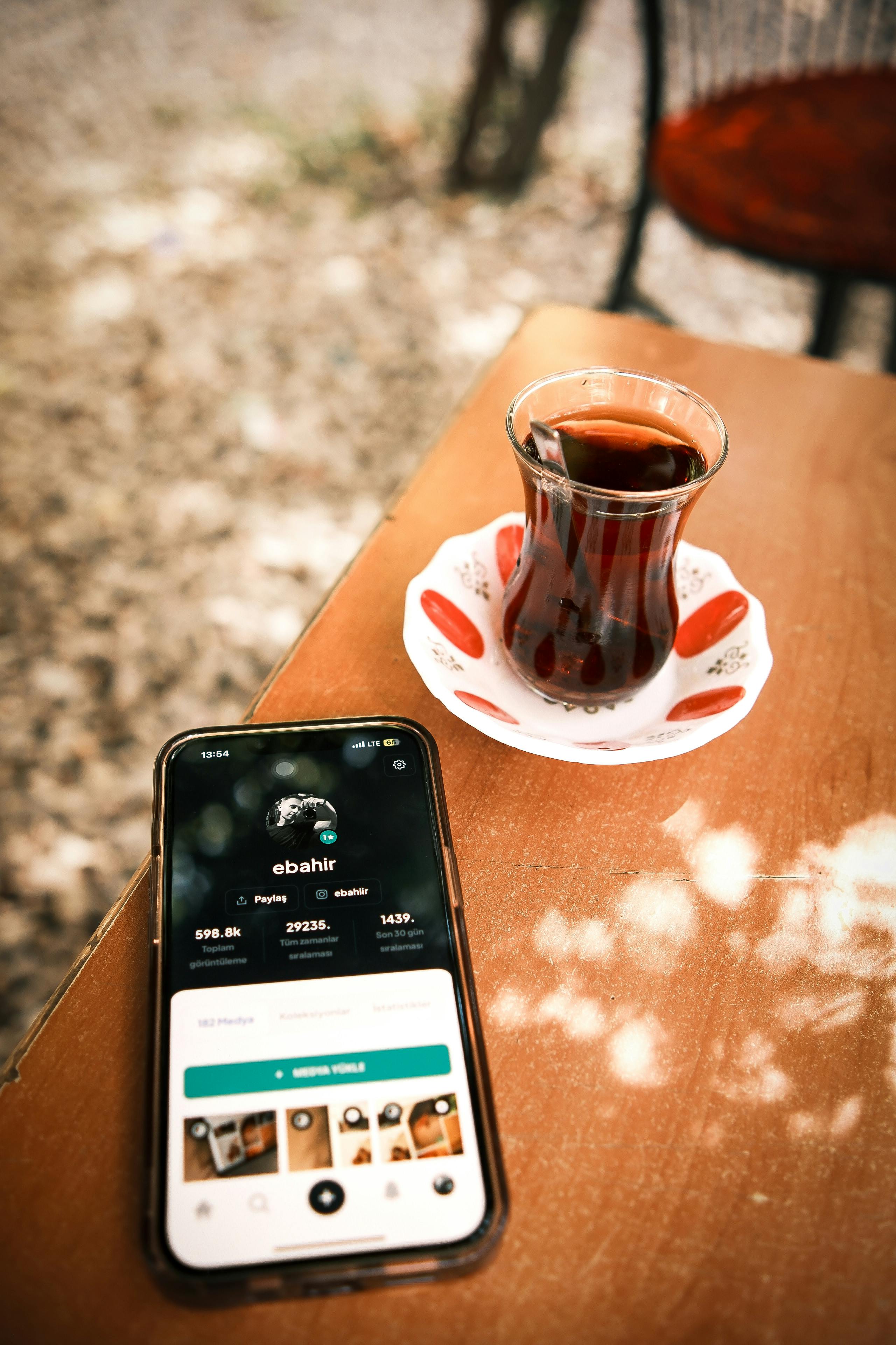 Mobile phone displaying online dating profile interface