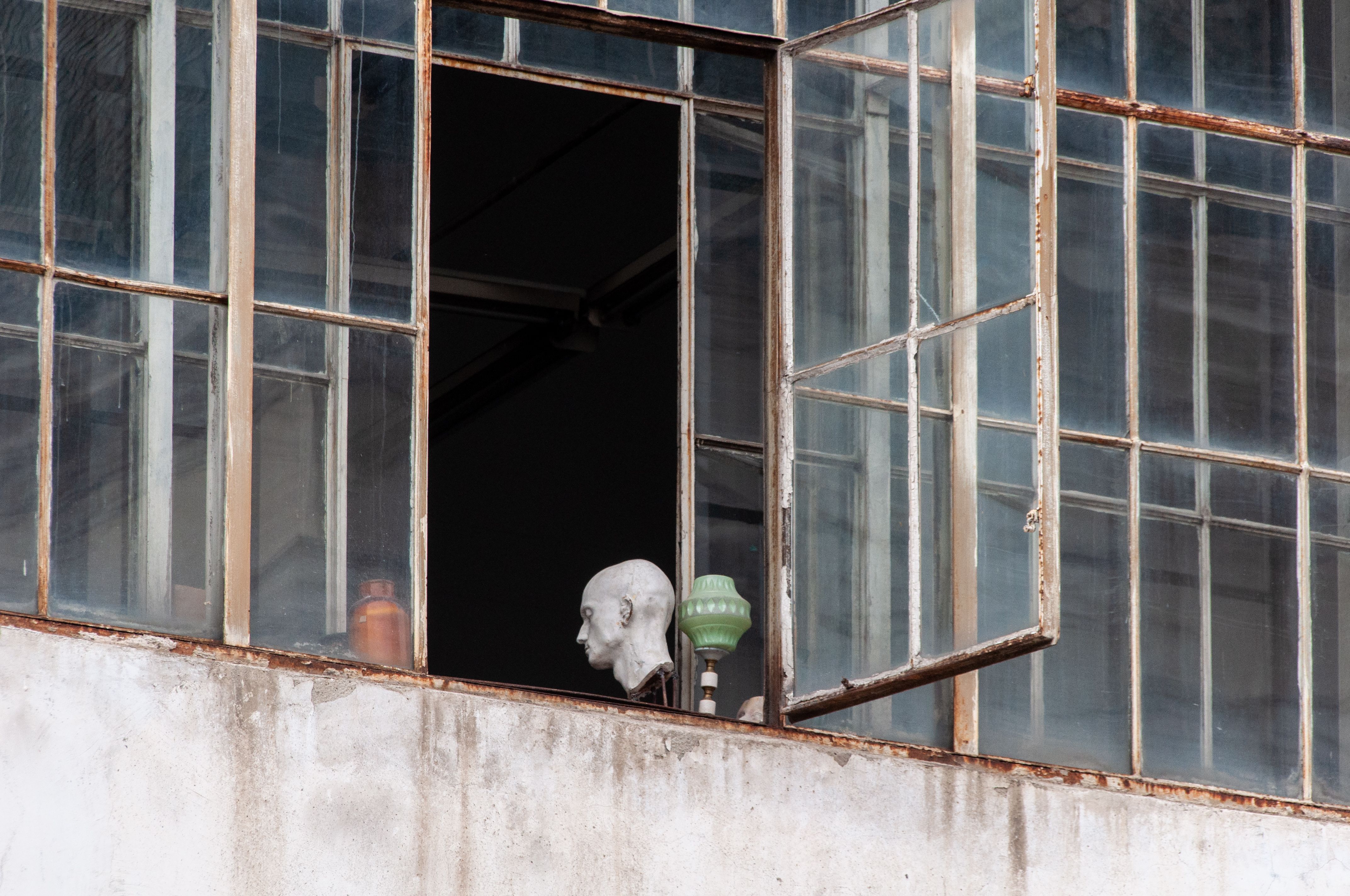Surreal Still Life in Open Industrial Window · Free Stock Photo