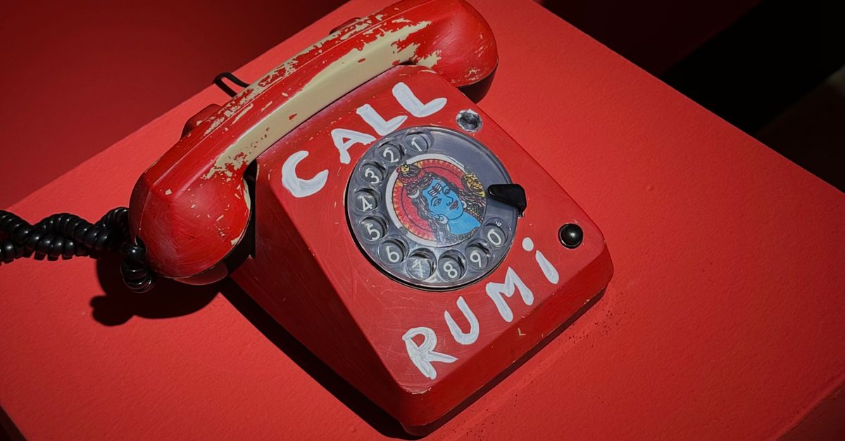 Call Real Rumi Vintage Red Rotary Phone with Call Rumi Text · Free Stock Photo