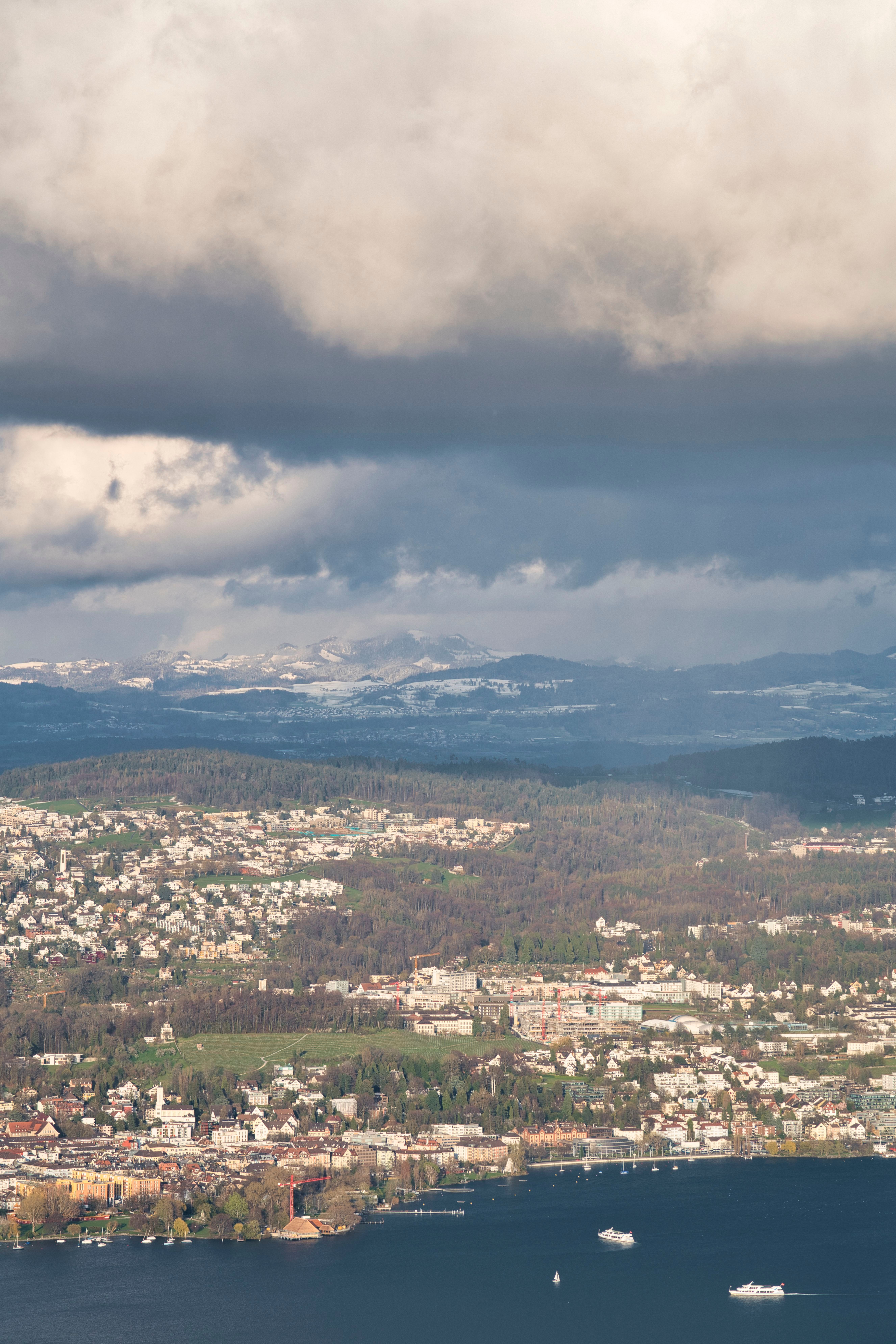 Aerial View of Zurich with Swiss Alps Backdrop · Free Stock Photo