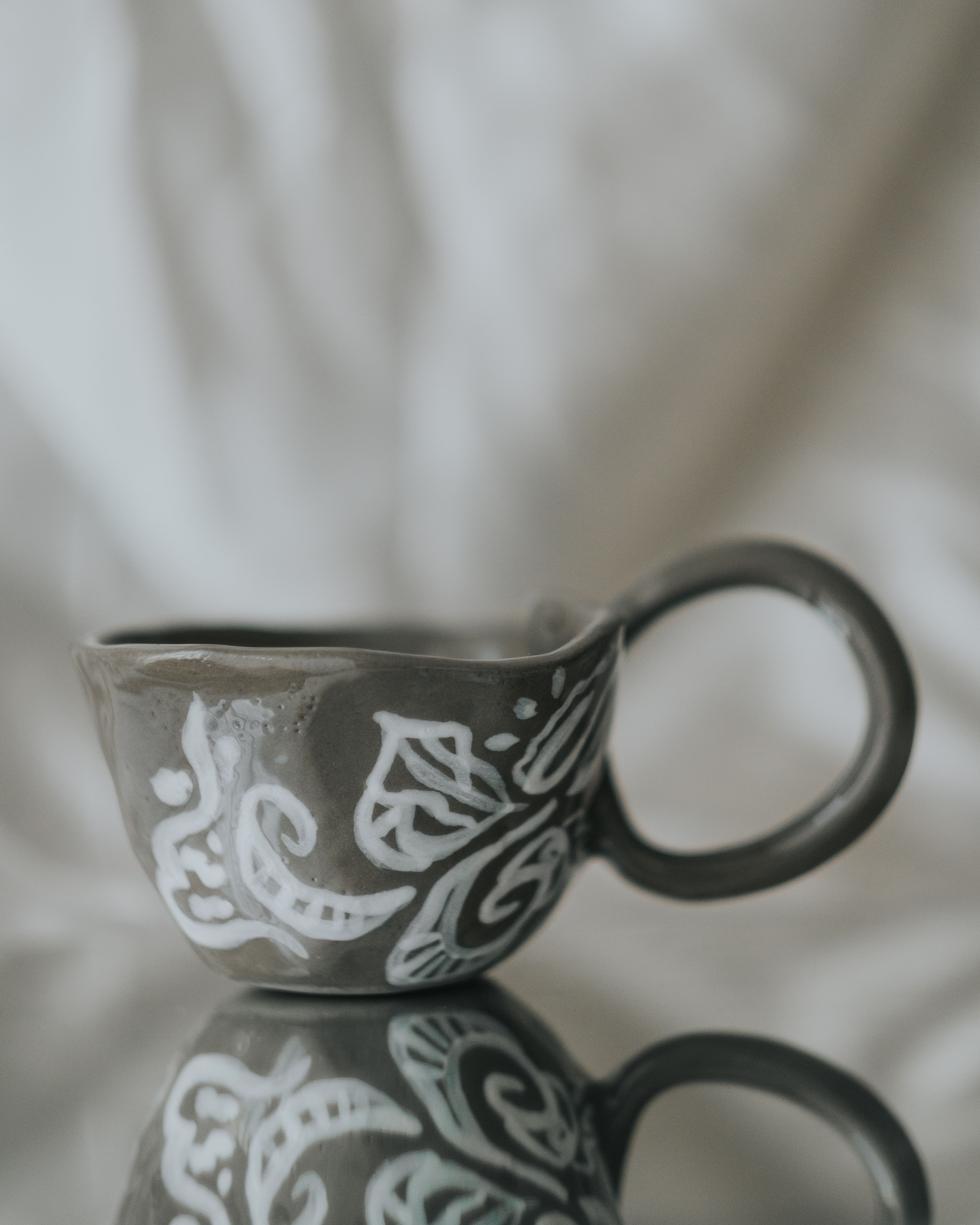 Beautifully Designed Ceramic Cup with Ethnic Patterns · Free Stock Photo