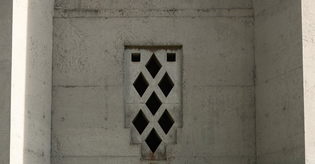 Photo by Tim Mossholder Art deco inspired window on a concrete building facade at Joint Base Pearl Harbor-Hickam, HI.