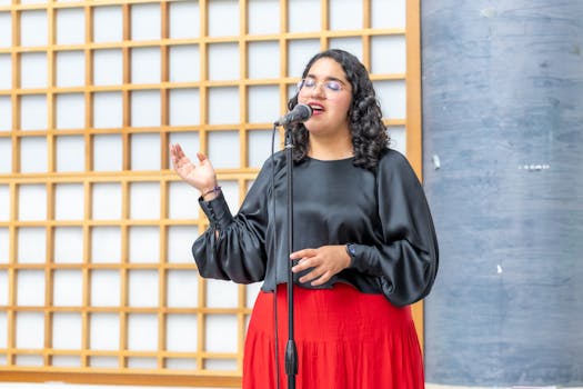 A woman passionately singing during a worship service in Ciudad de México, CDMX, México.