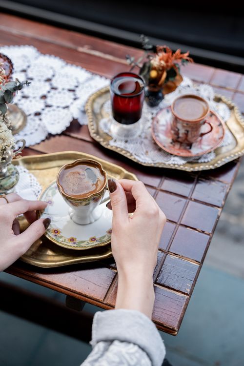 Free A stylish serving of traditional Turkish coffee on a gold tray with ornate cups and decor. Stock Photo
