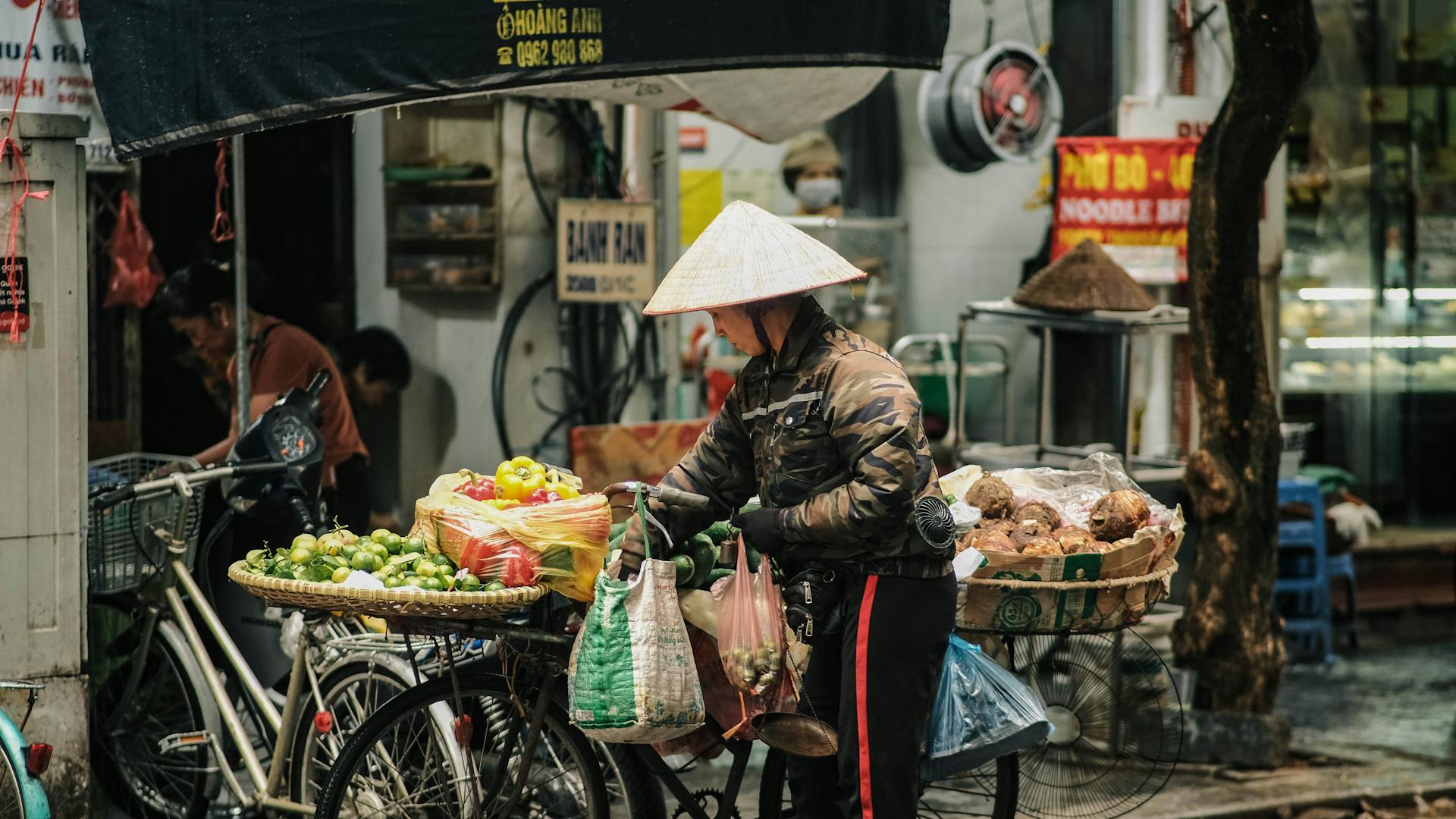 Bustling Hanoi Street Market Vendor Scene