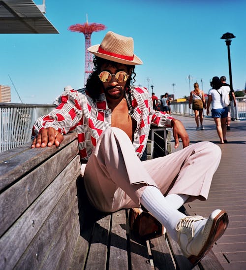 Men's Red and White Button-up Shirt and Pink Pants