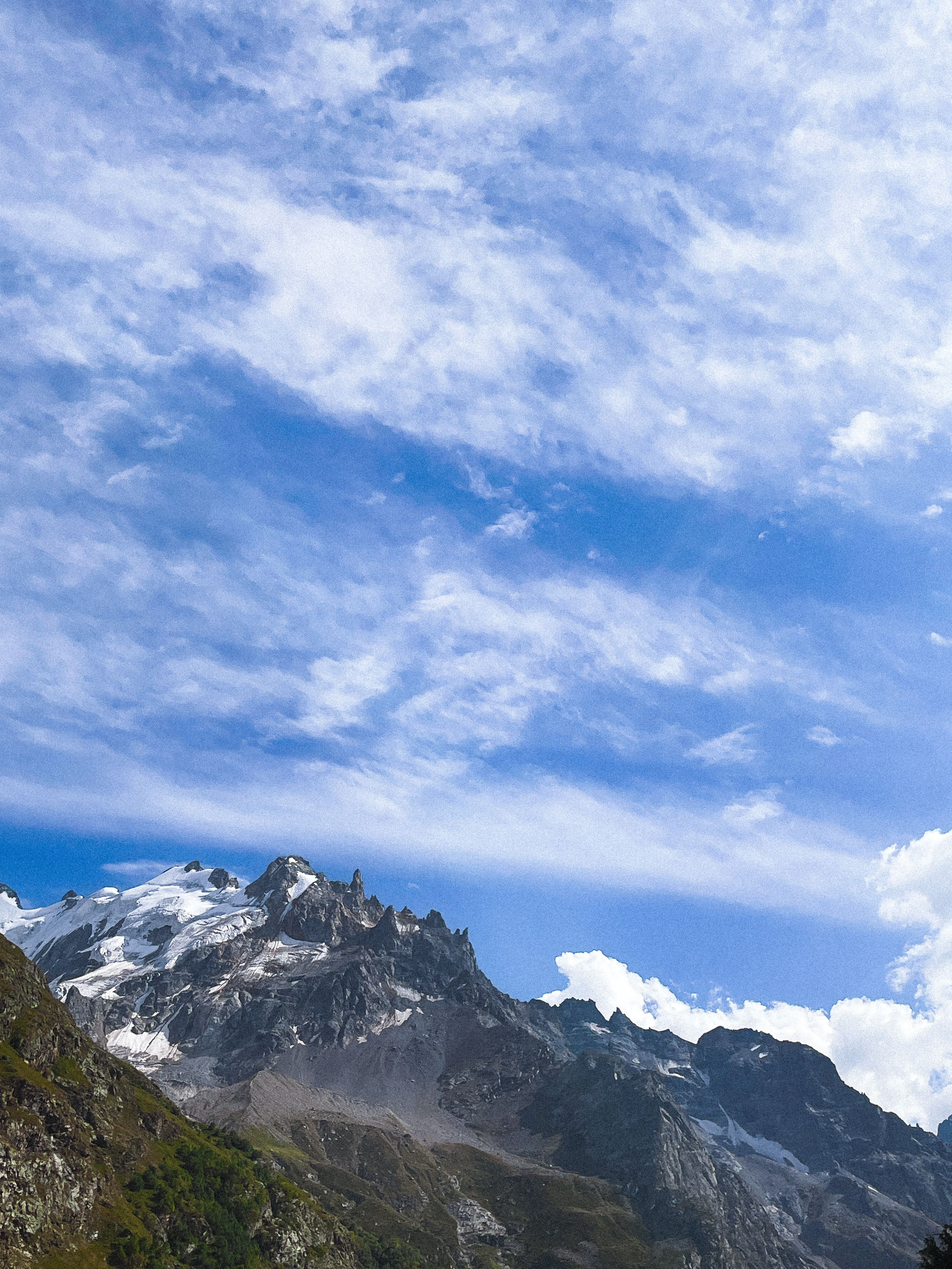 Majestic Alpine Mountain Under Clear Blue Sky · Free Stock Photo