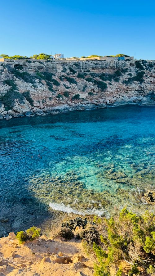 Free Beautiful clear waters and rocky cliffs in Ibiza, Spain. Stock Photo