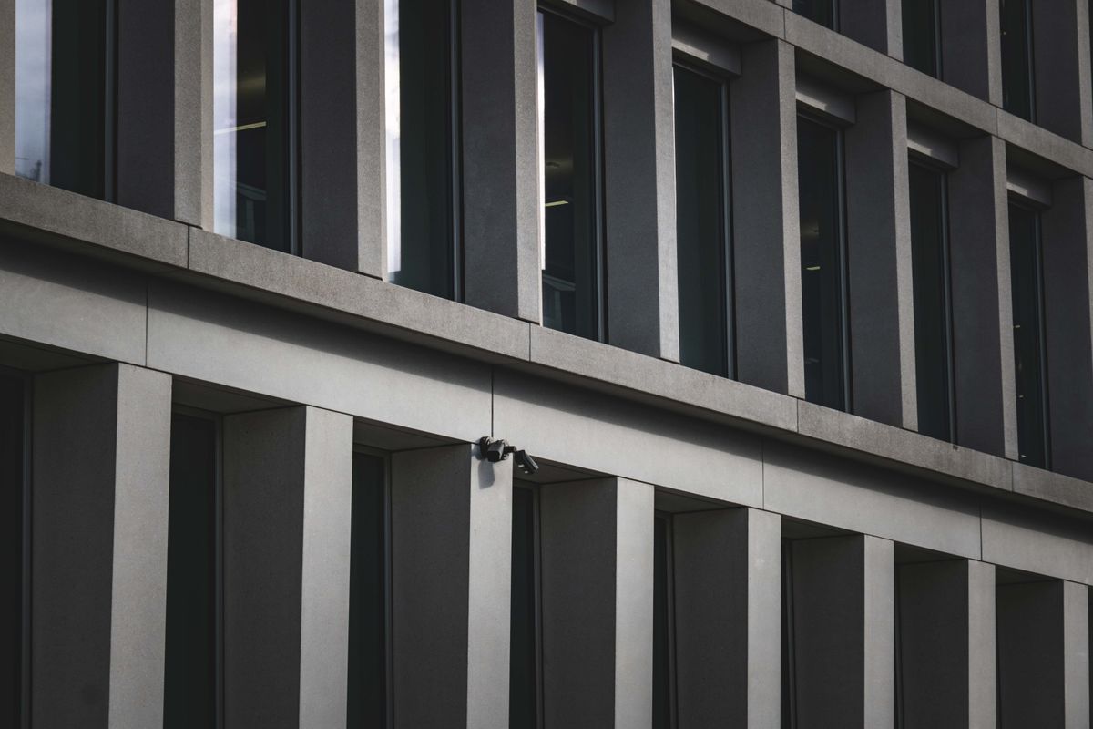 Modern office facade with security cameras