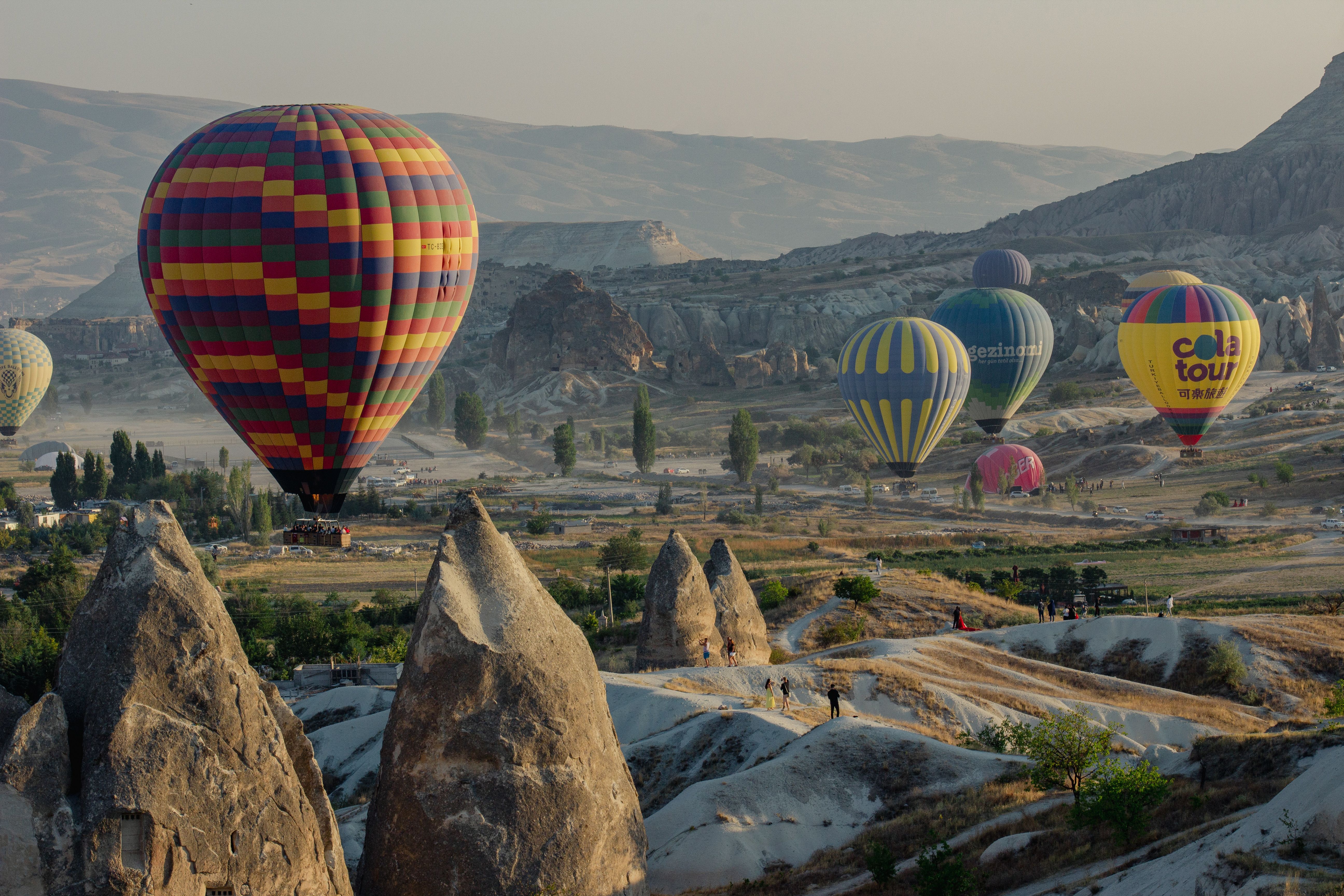 Colorful Hot Air Balloons Over Cappadocia Landscape · Free Stock Photo