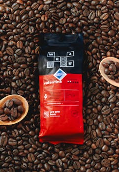A vibrant display of coffee beans surrounding premium packaging, highlighting quality.