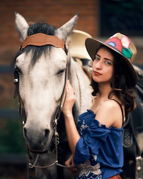 Woman in traditional Mexican attire with a horse, highlighting charro culture in Mexico City.