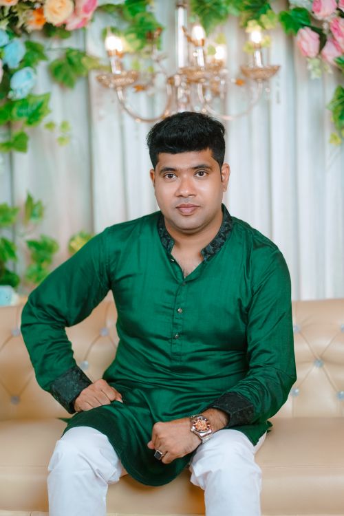 Free Portrait of a man in traditional attire at a Bengali wedding in Cumilla, Bangladesh. Stock Photo