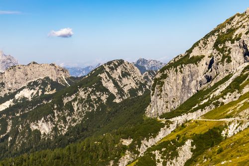Free Breathtaking aerial view of the stunning Julian Alps under a clear blue sky. Stock Photo