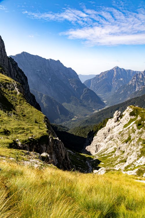 Free Explore the breathtaking alpine scenery of the Julian Alps with lush meadows and towering peaks. Stock Photo