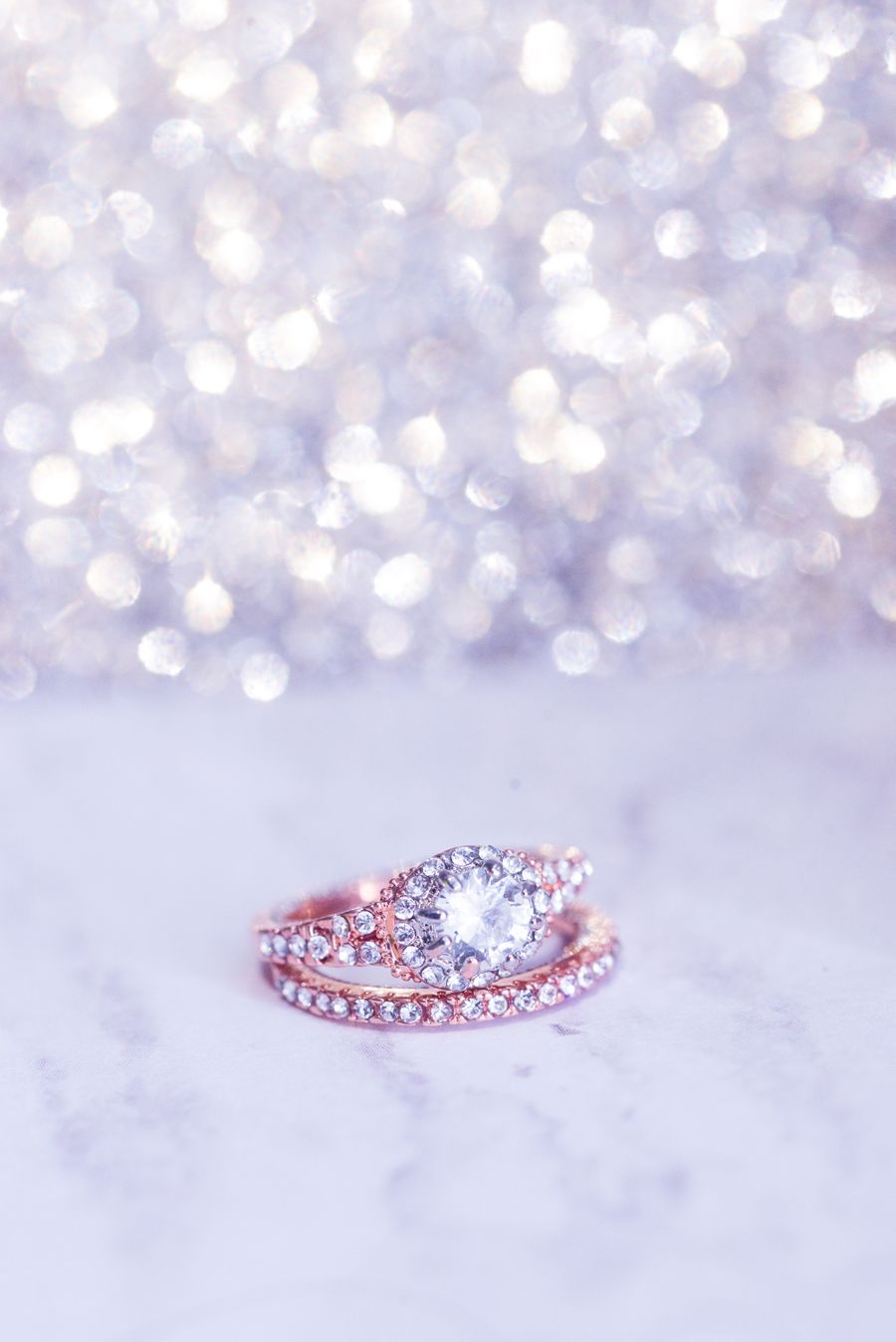 Sparkling diamond engagement ring on marble
