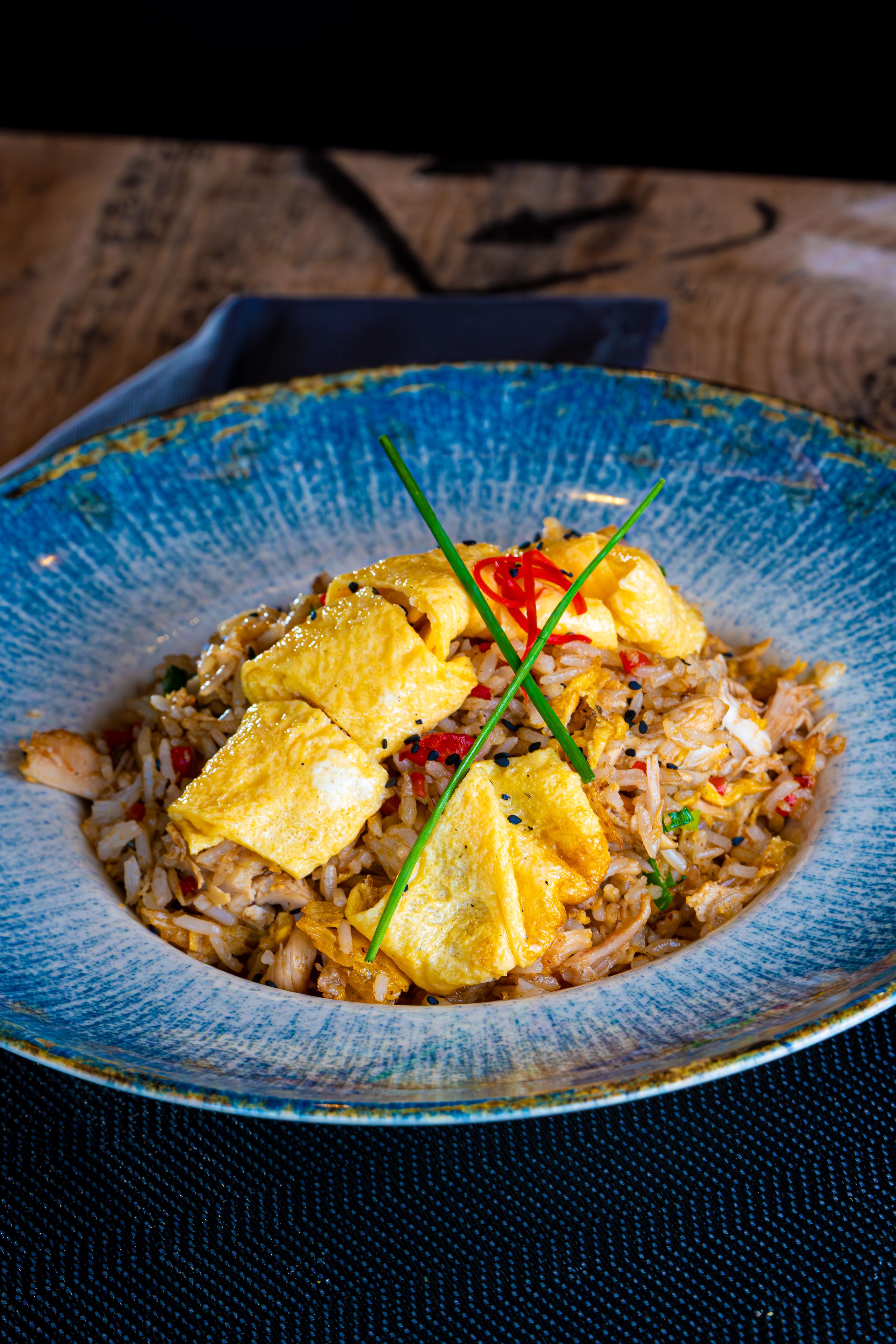 delicious chicken fried rice with omelette topping