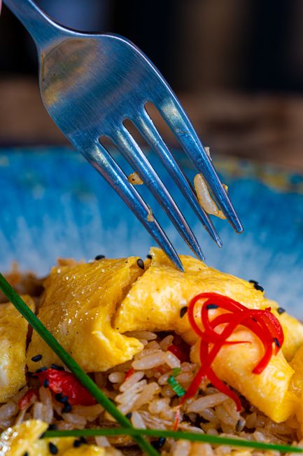Fast, restaurant-style egg fried rice made with day-old rice, scrambled egg, and scallions, tossed hard and fast in a hot wok for separate, lightly crisped