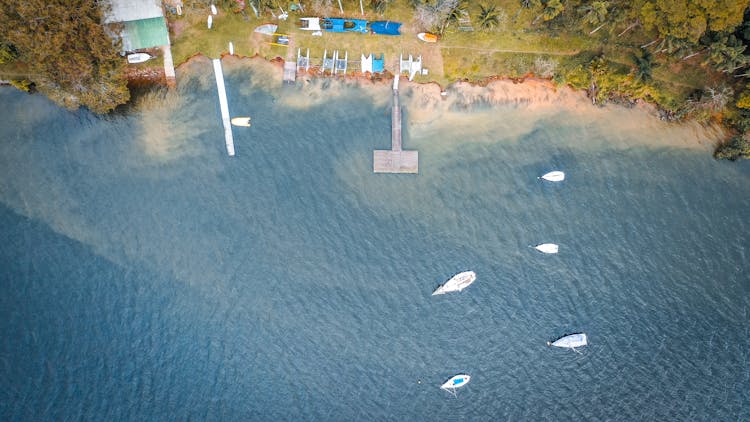 Aerial Photography Of Boats Near The Coast