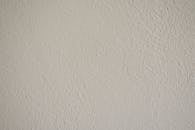 Textured White Wall Background for Design