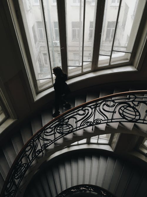 Woman Walking On Stairs