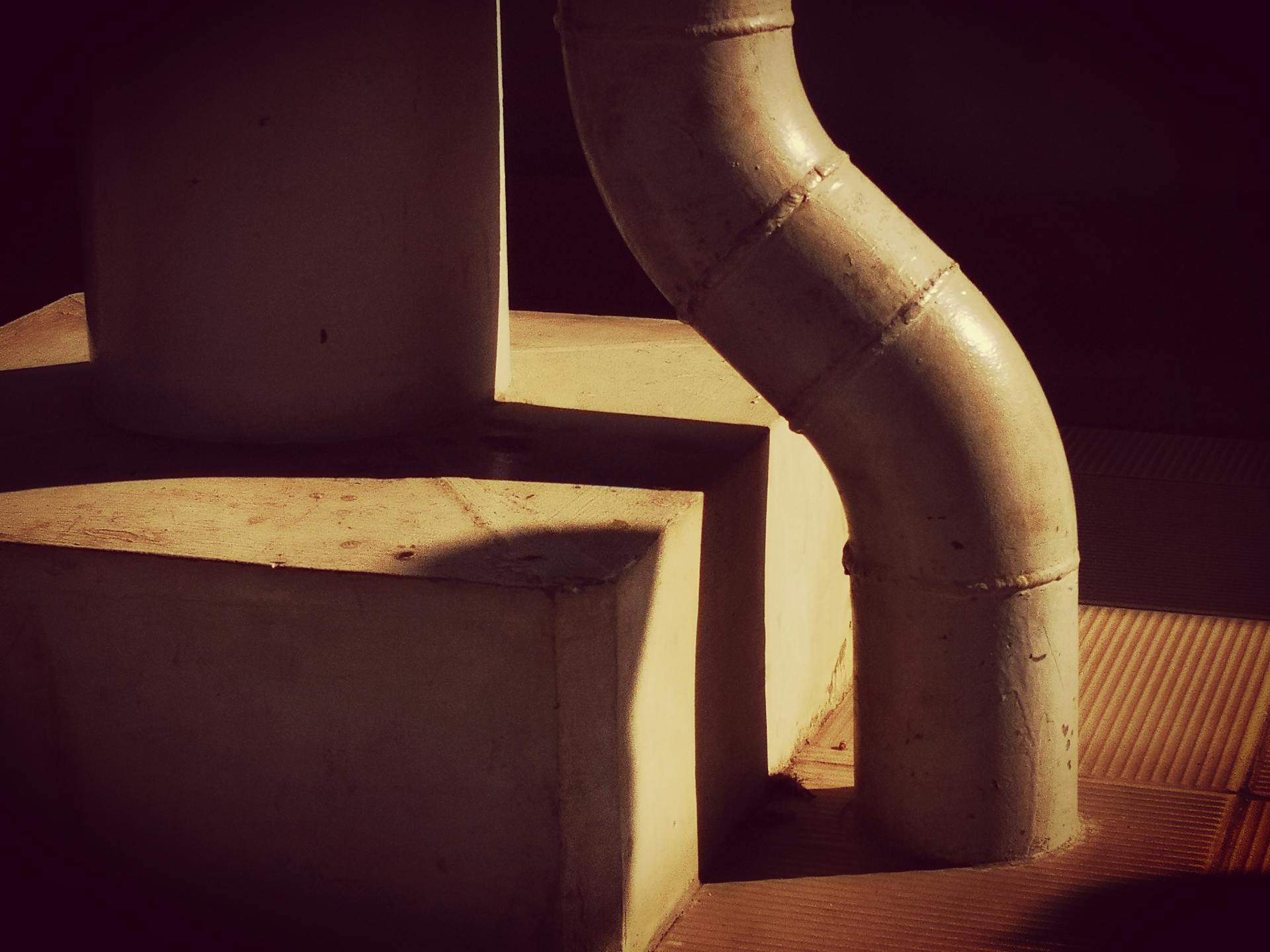 Industrial Pipe and Shadow in Artistic Light