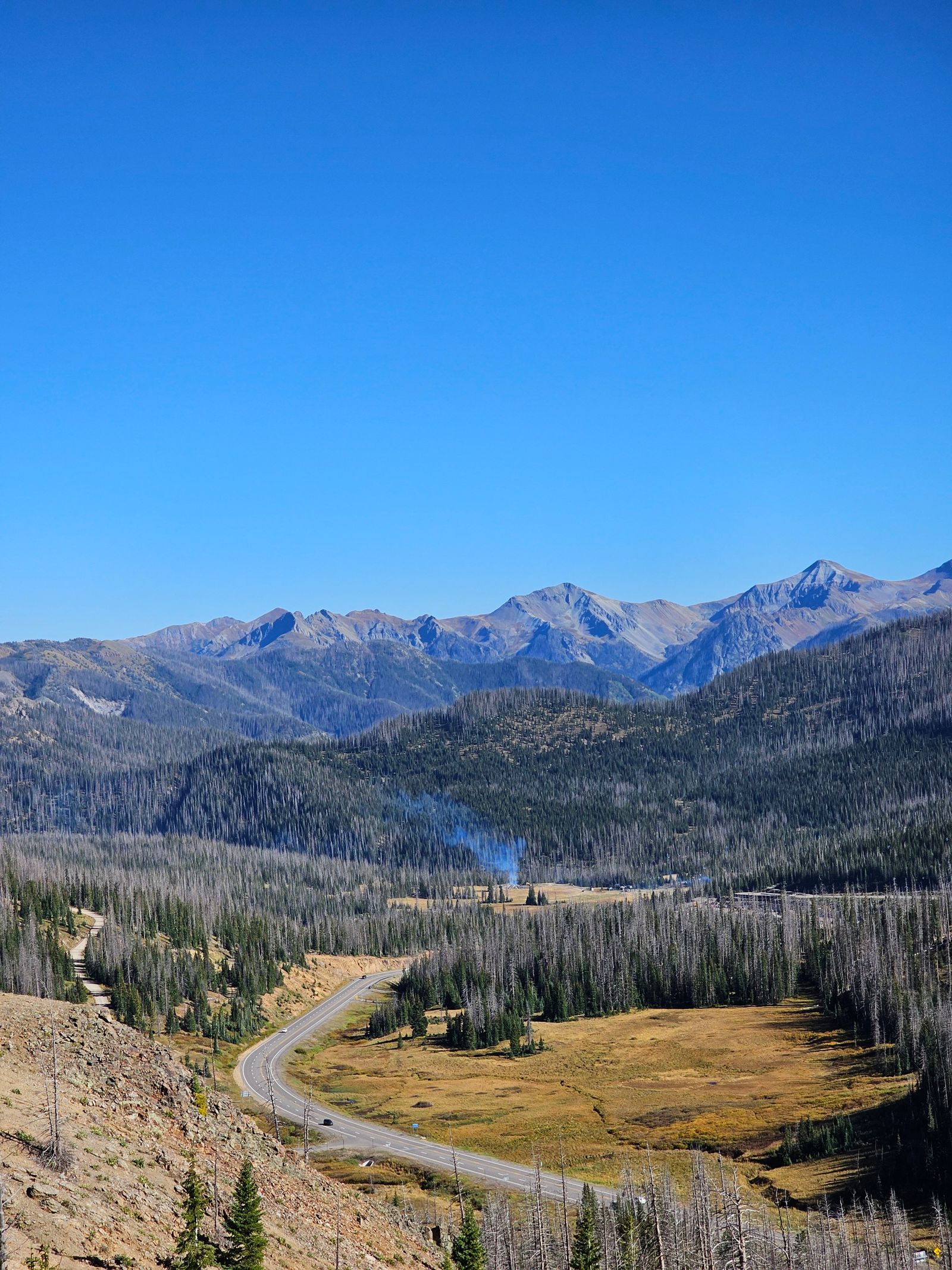 The Million Dollar Highway — carved into cliff faces above the Animas River gorge with no guardrails