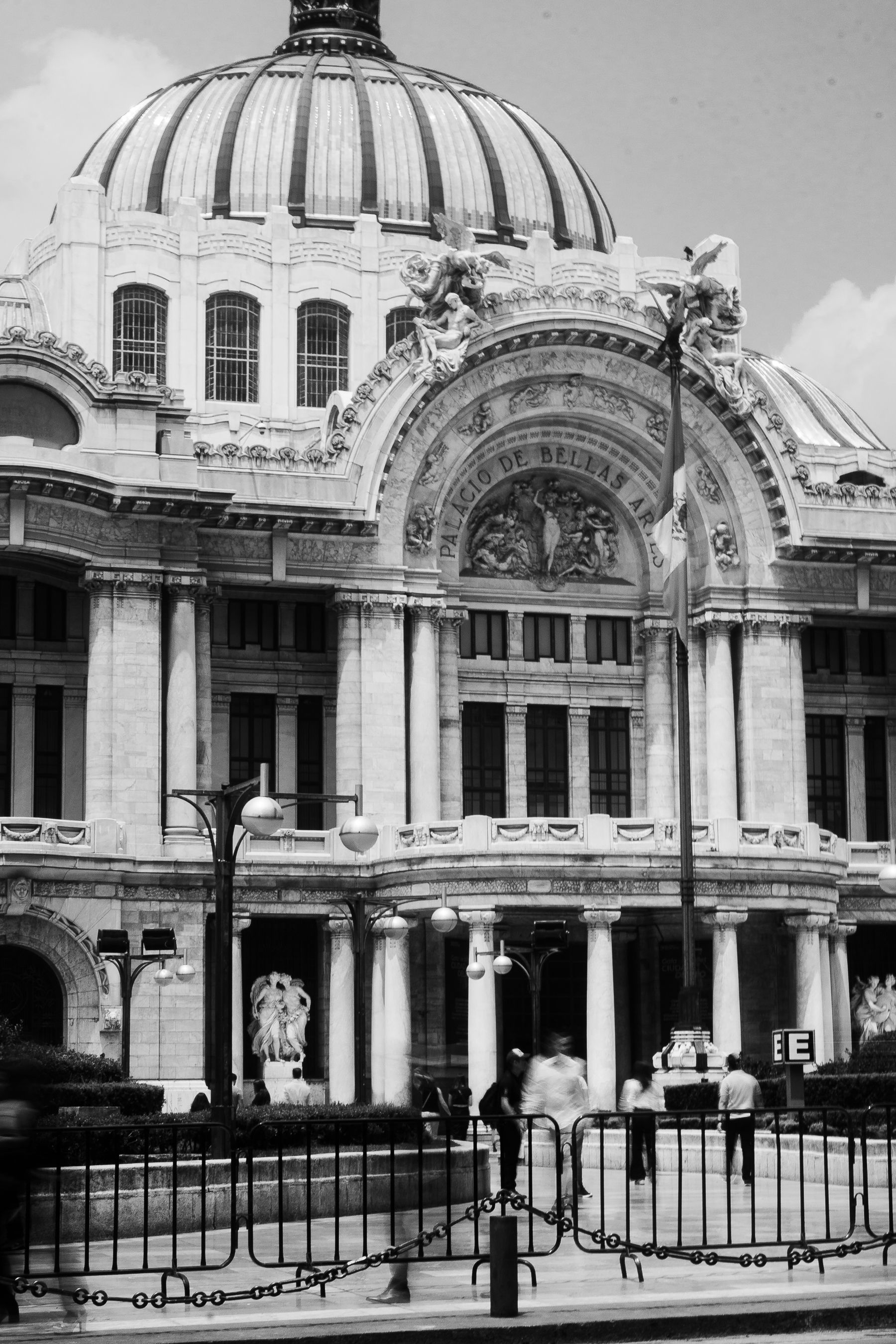 Elegant black and white photo of the Palacio de Bellas Artes in Mexico City.