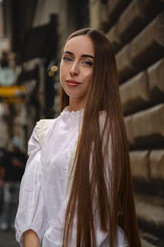 A captivating portrait of a young woman in Florence, showcasing classic Italian architecture.