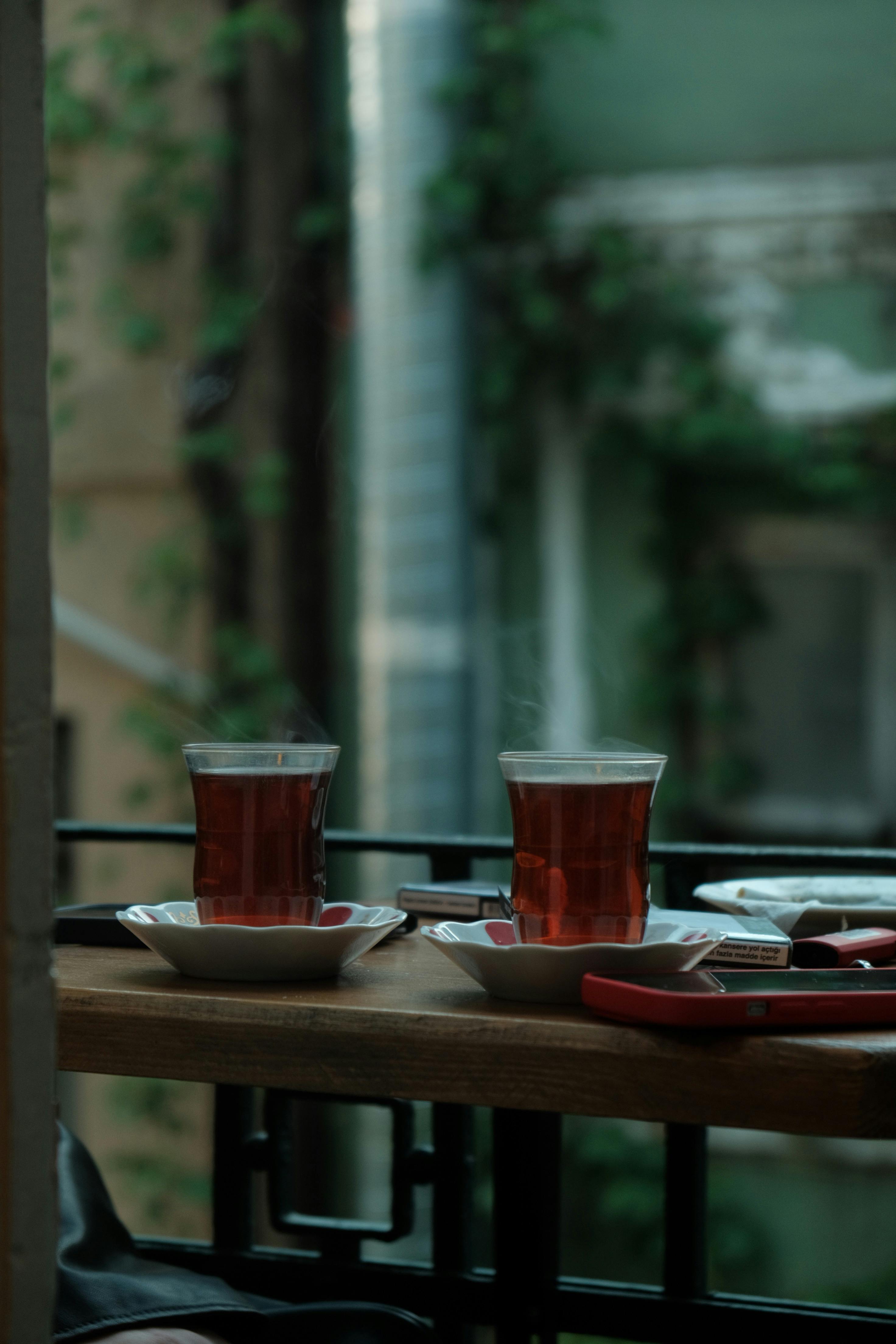 cozy outdoor tea setting with two glasses