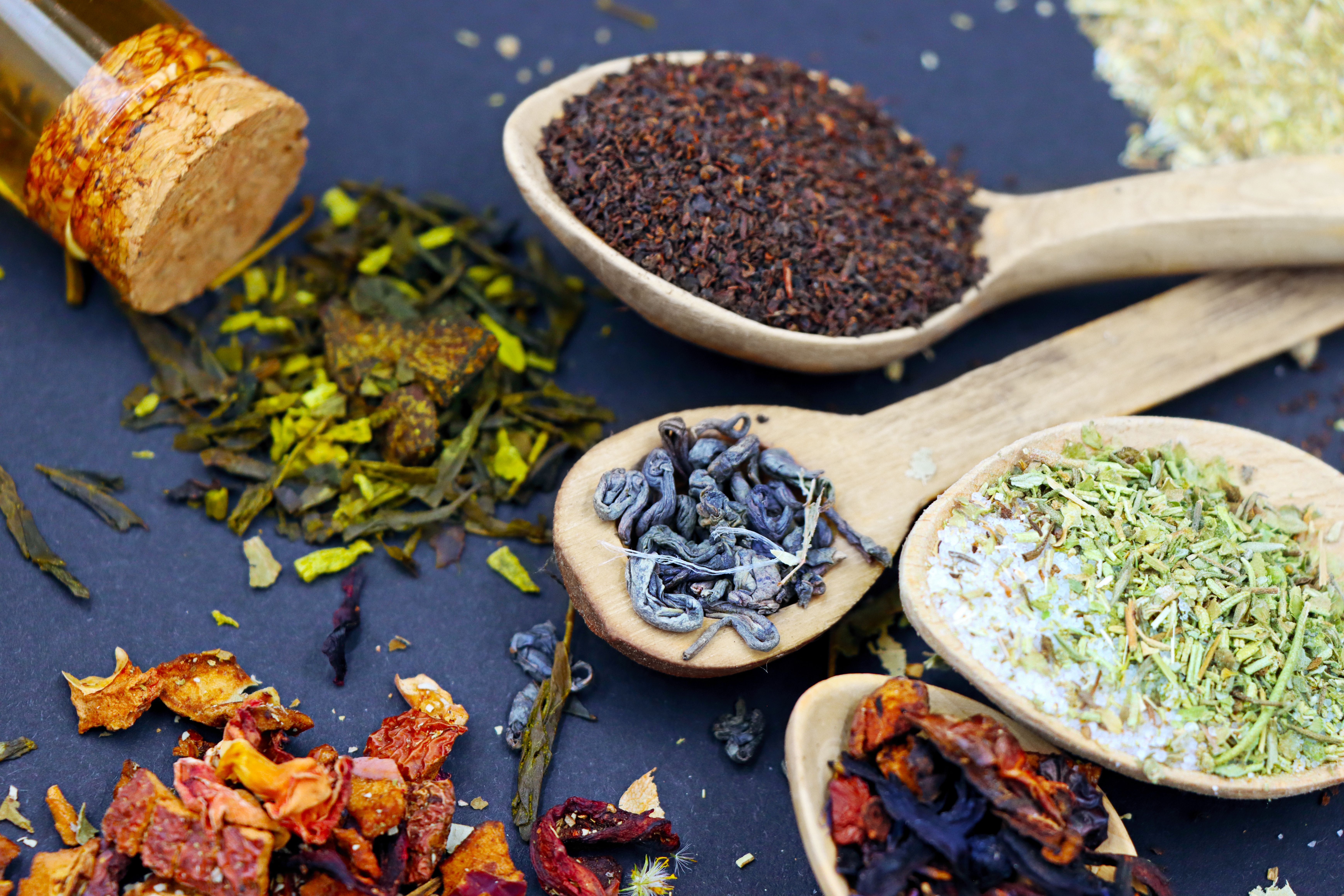 Assorted Loose Leaf Herbal Teas with Wooden Spoons · Free Stock Photo