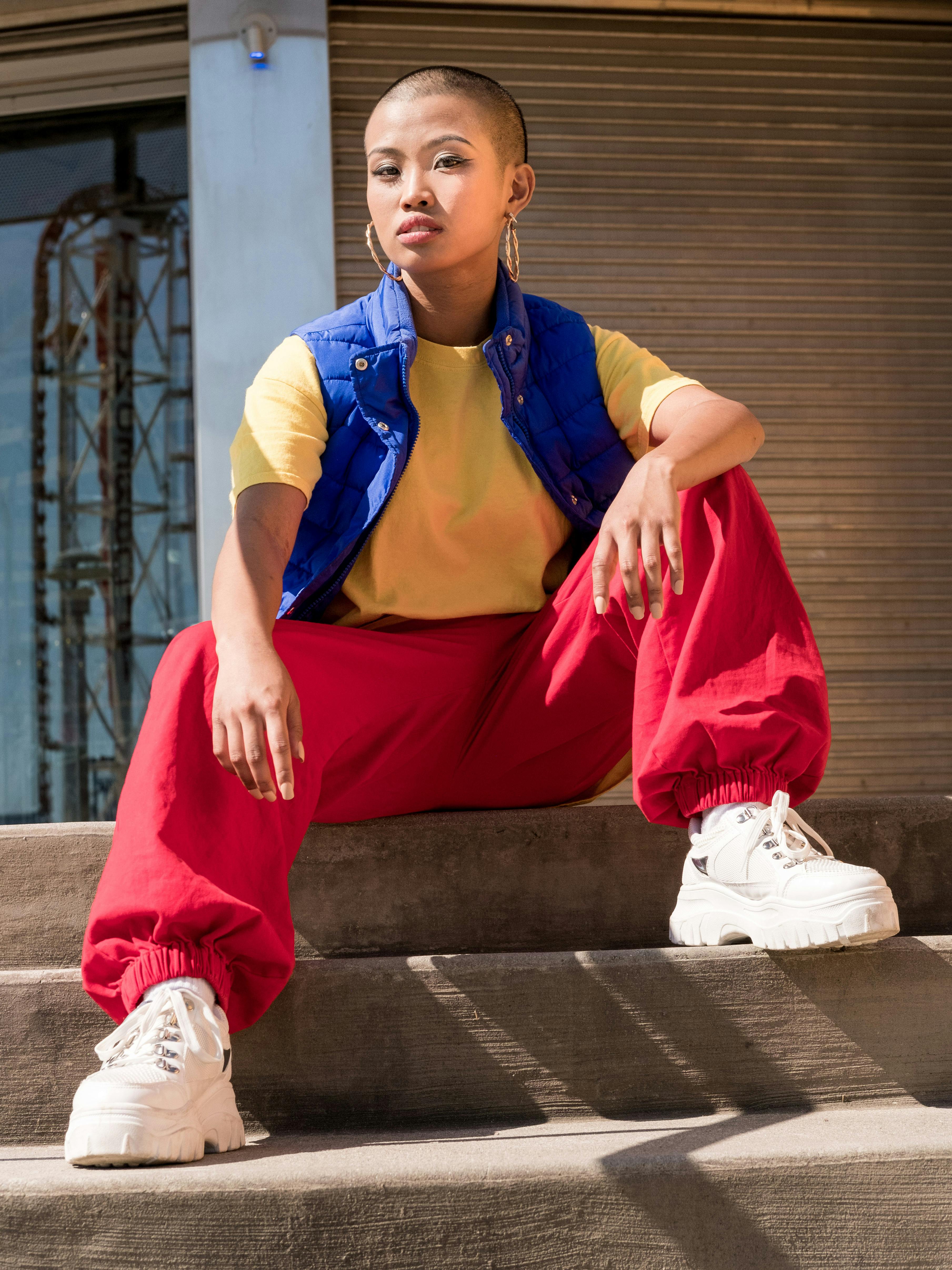 Bold Color-Blocked Outfit: Red Pants and Yellow Blouse