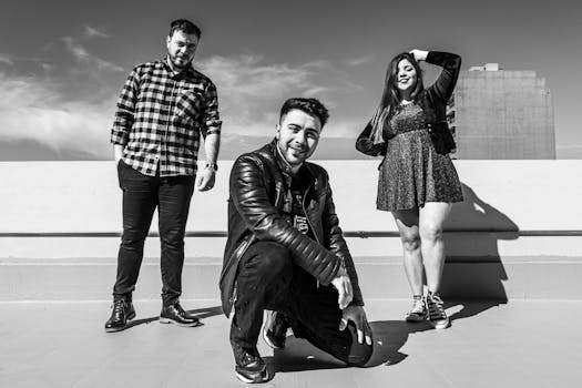 A stylish black and white rooftop portrait of three young adults in Buenos Aires.
