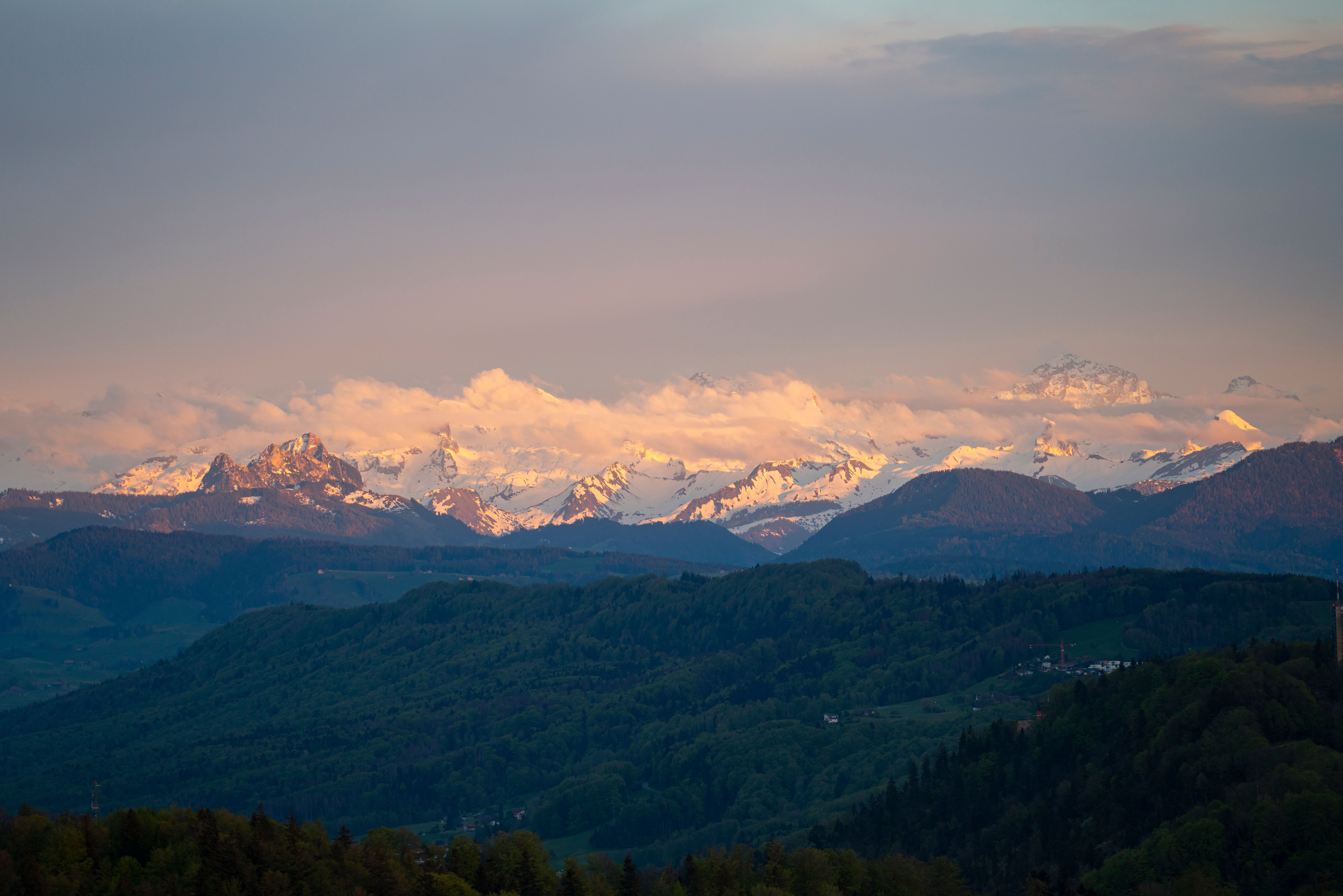 Breathtaking Sunset Over Snowy Mountain Range · Free Stock Photo
