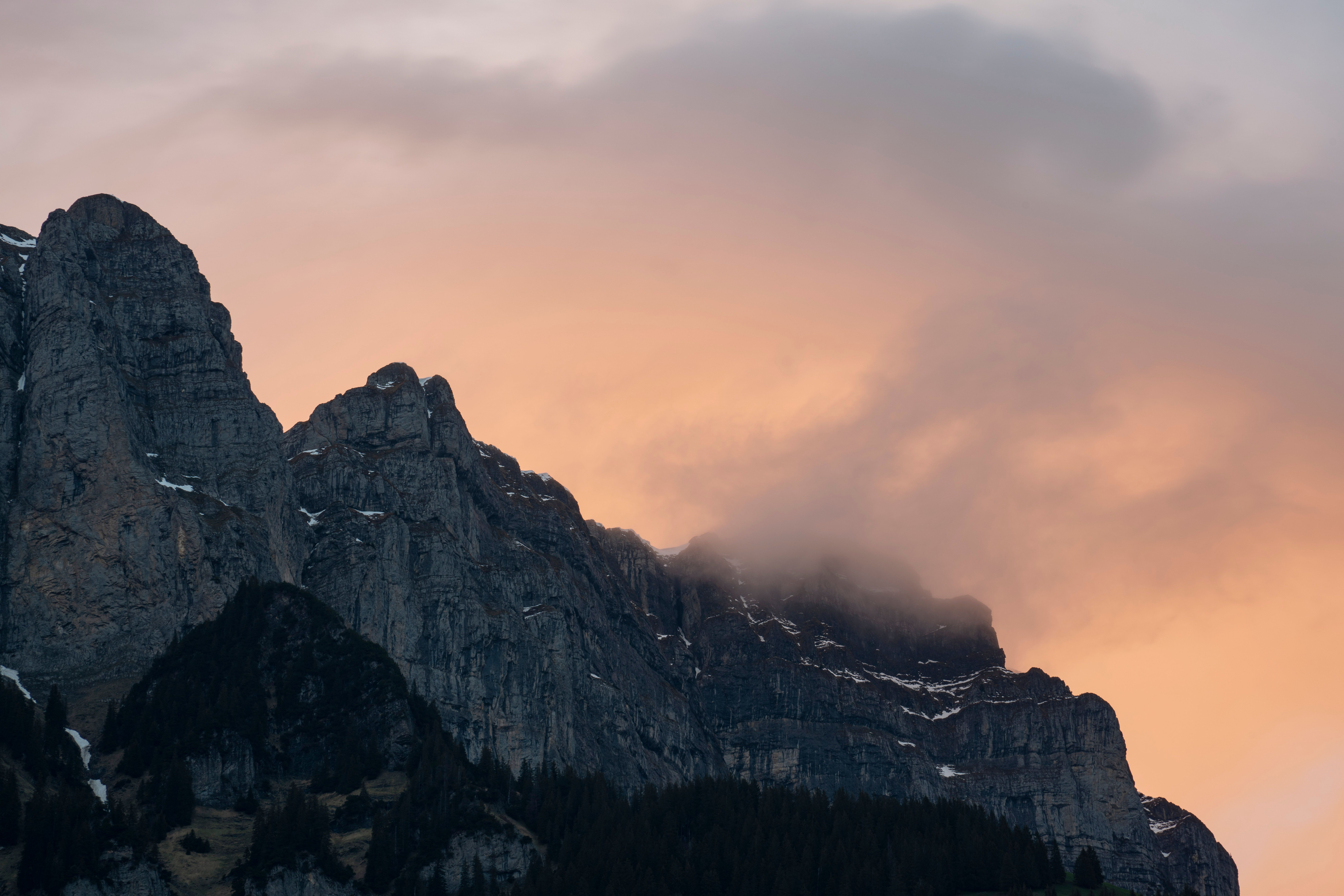 Majestic Mountain Peaks at Sunset · Free Stock Photo