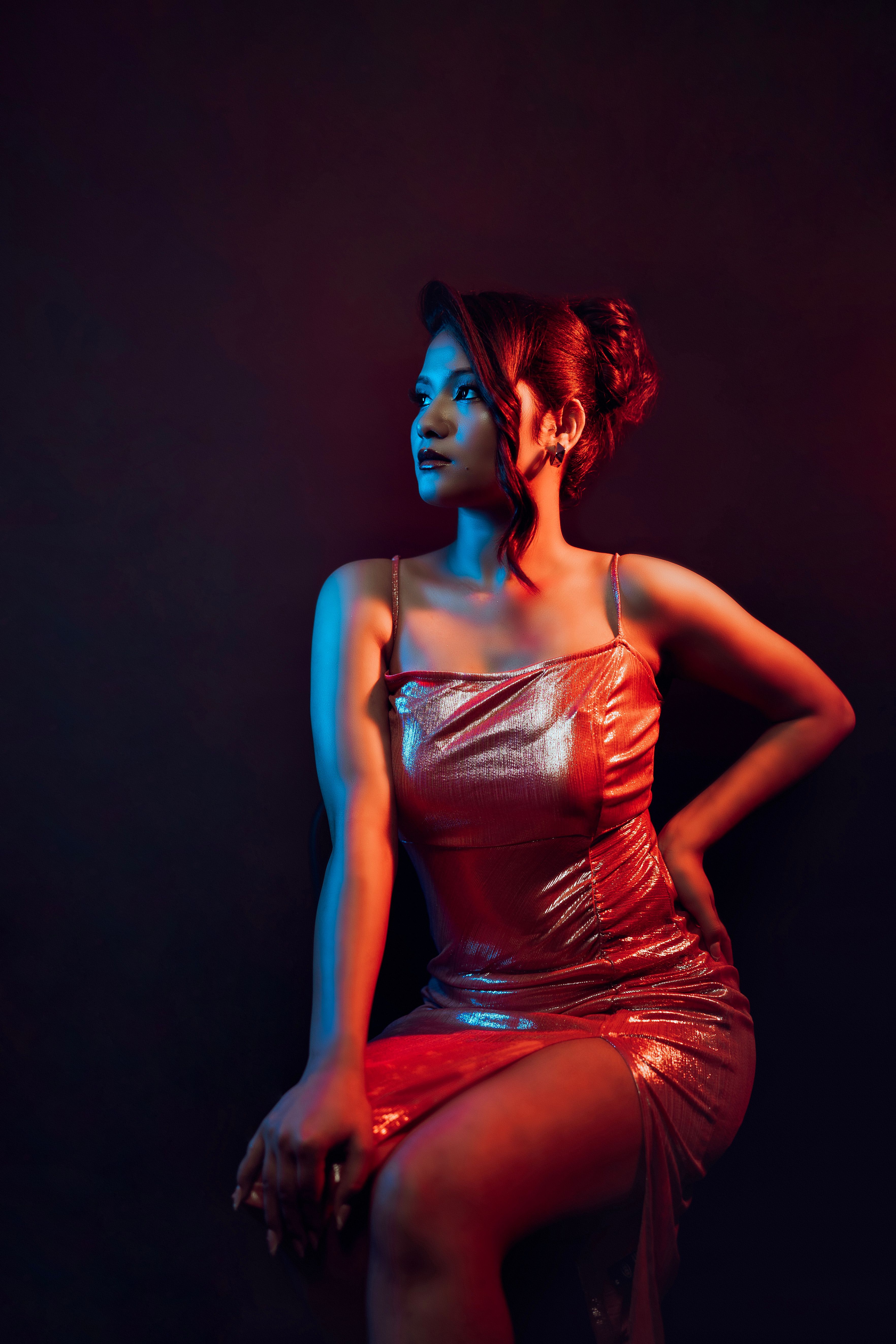 Elegant Woman in Red Dress in Dramatic Lighting · Free Stock Photo