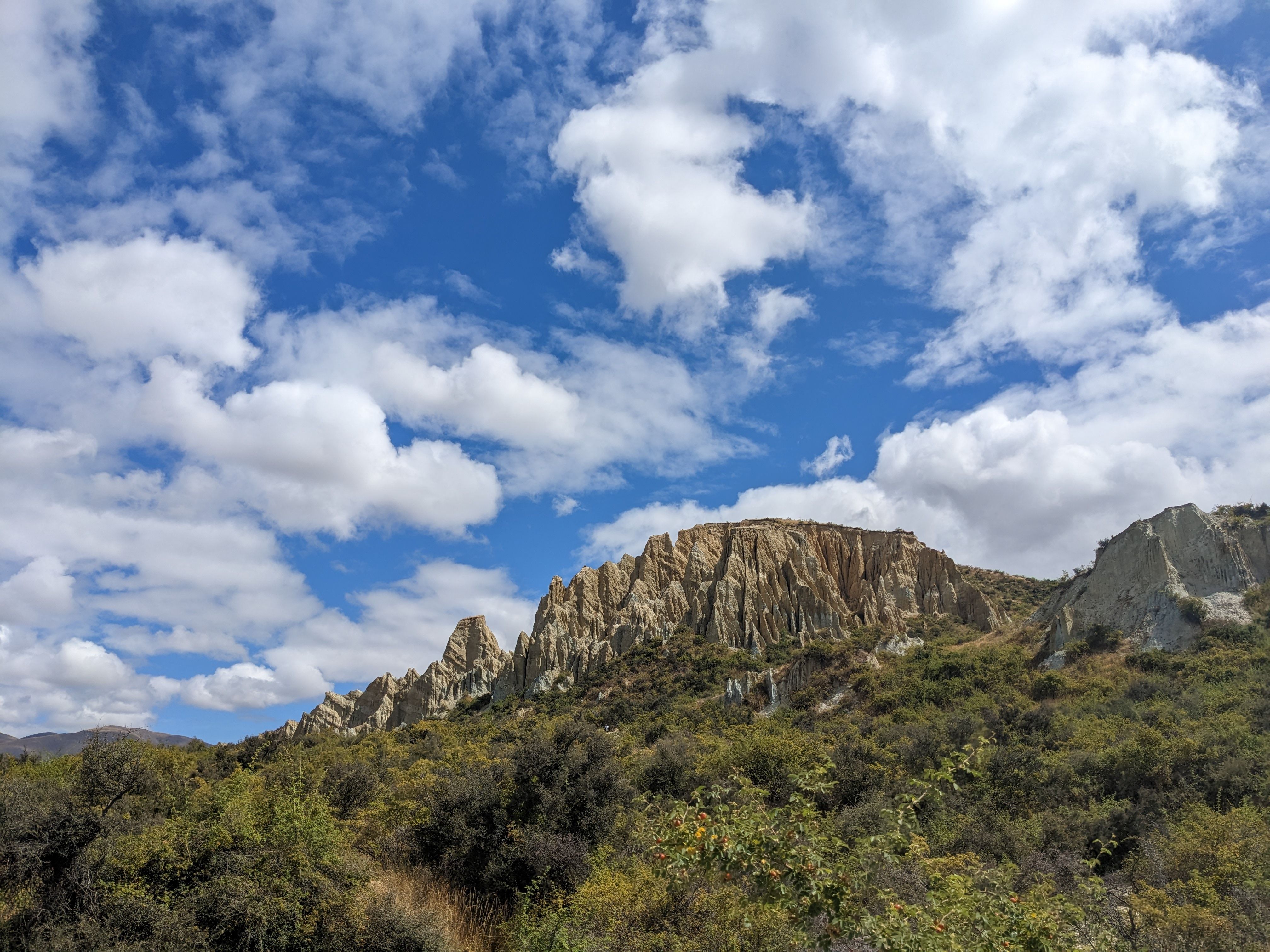 Majestic Rock Formations Under Blue Sky · Free Stock Photo
