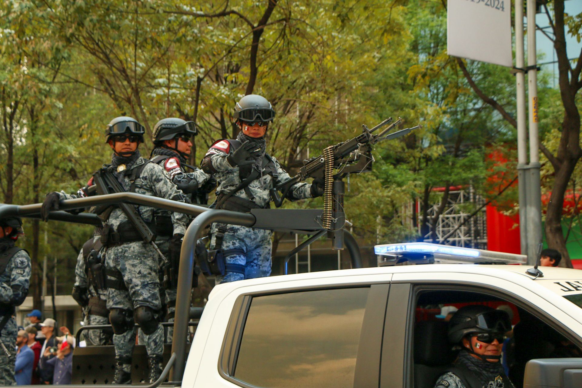 Military Tactical Unit in Parade with Armed Vehicle
