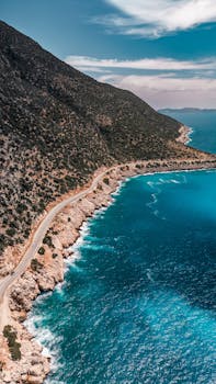 Stunning aerial view of the vibrant blue coastline in Antalya, Türkiye.