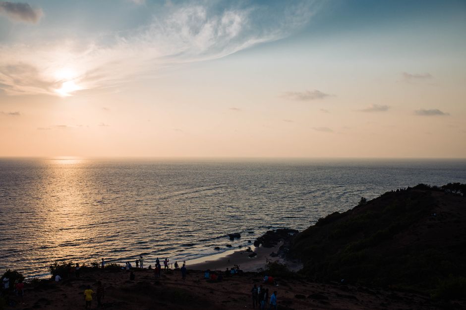 A stunning sunset over the Arabian Sea at Chapora Beach, Goa, India.