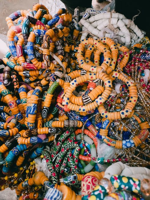 Free A vibrant assortment of handmade African beaded bracelets showcasing intricate designs and vivid colors. Stock Photo