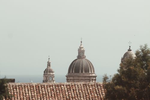 Free Charming view of ancient domes and rooftops in Catania, Sicily, Italy. Stock Photo