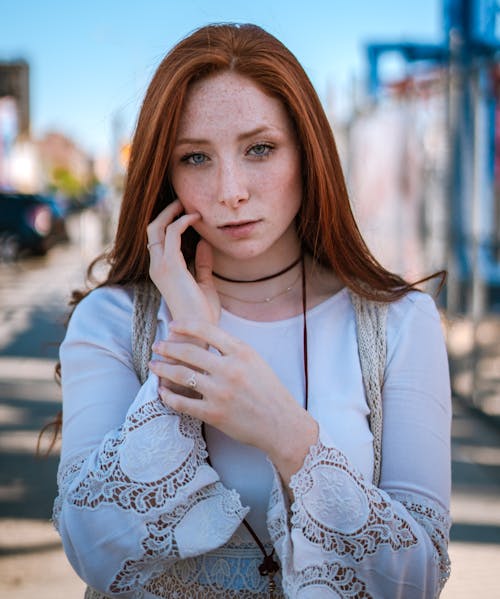 Woman Touching Her Cheek