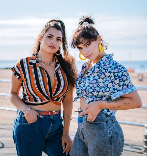 Photo Of Woman Standing Next To Each Other