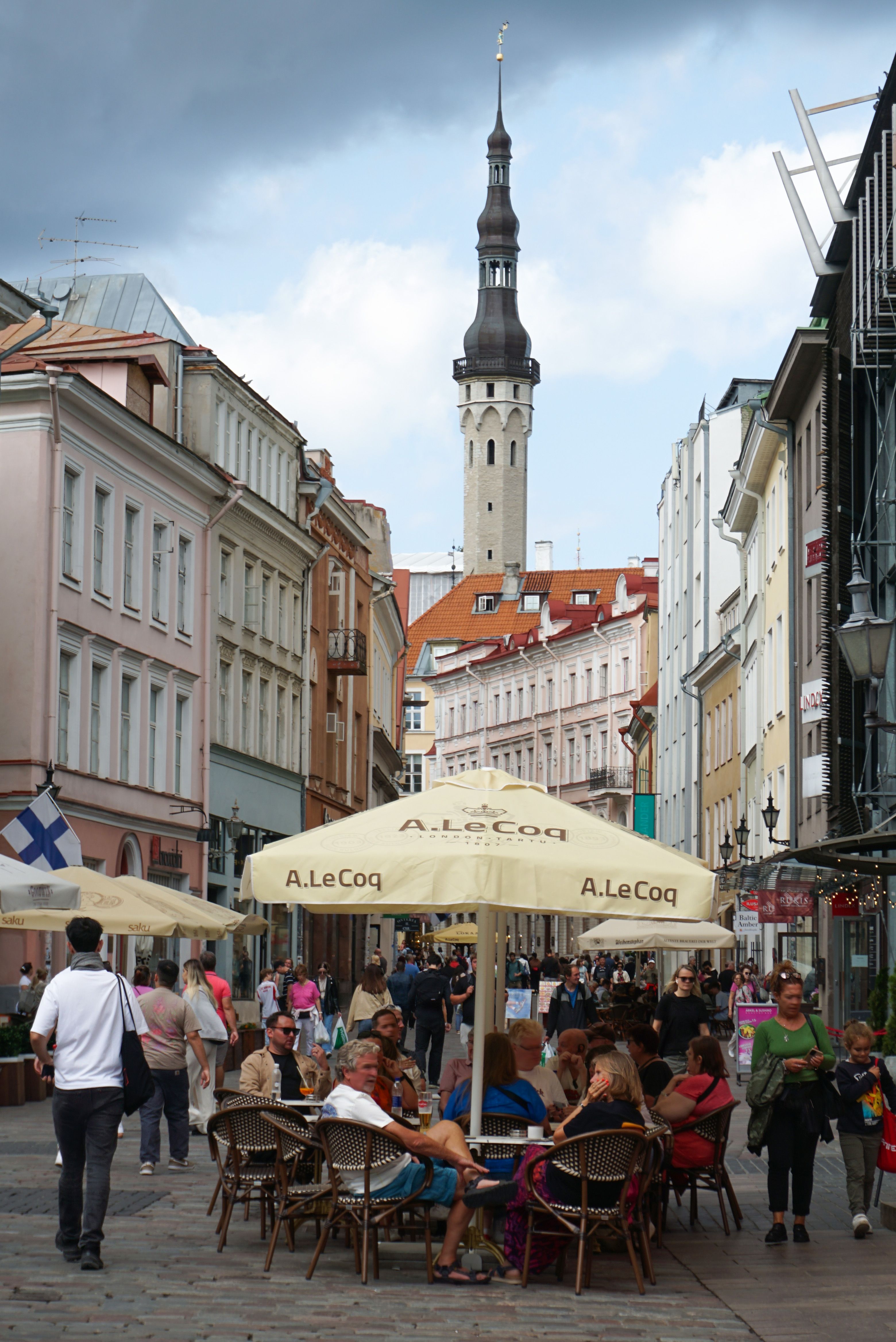 A vibrant street scene in a small town with local shops and restaurants