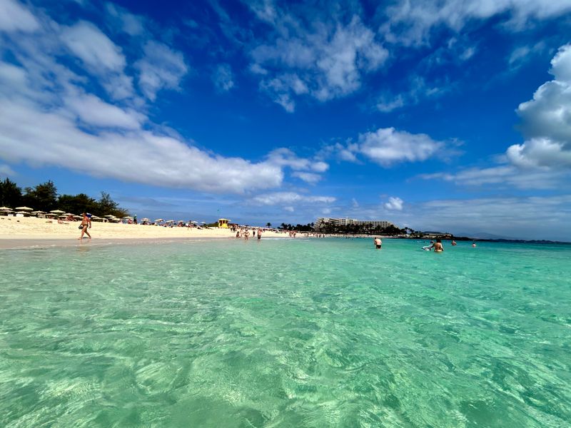 Golden dunes and turquoise sea at Corralejo, Fuerteventura